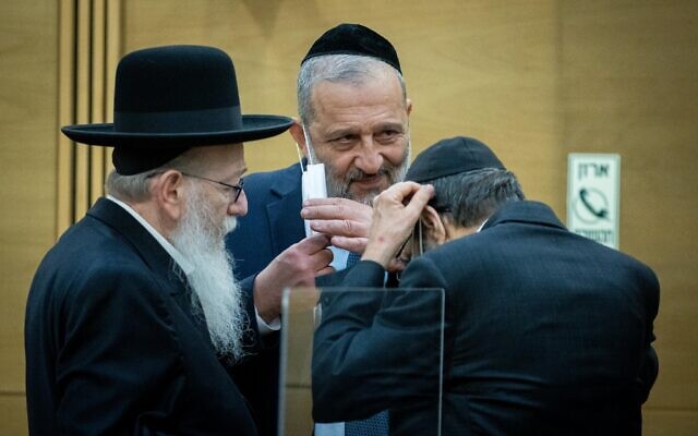 Haredi party leaders Aryeh Deri of Shas, center, and Yaakov Litzman, left, and Moshe Gafni of United Torah Judaism, at a press conference at the Knesset in Jerusalem, on May 6, 2021. (Yonatan Sindel/Flash90) Haredi party leaders Aryeh Deri of Shas, center, and Yaakov Litzman, left, and Moshe Gafni of United Torah Judaism, at a press conference at the Knesset in Jerusalem, on May 6, 2021. (Yonatan Sindel/Flash90)