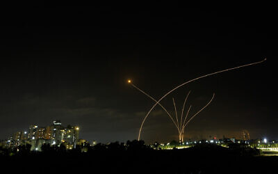 A long exposure picture shows Iron Dome anti-missile system fire as rockets are launched from the Gaza Strip, Ashkelon, May 10, 2021. (Edi Israel/Flash90)
