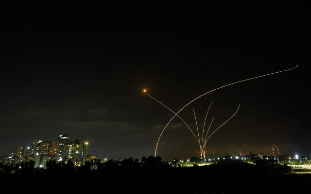 A long exposure picture shows Iron Dome anti-missile system fire as rockets are launched from the Gaza Strip, Ashkelon, May 10, 2021. (Edi Israel/Flash90)