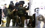 Illustrative -- Israeli security forces during clashes in the West Bank city of Hebron, May 10, 2021 (Wisam Hashlamoun/Flash90)