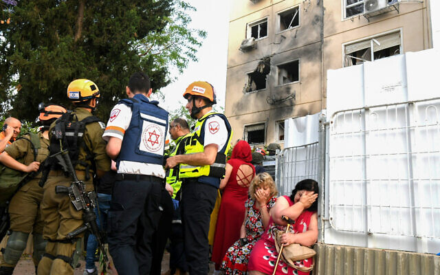 The scene where an apartment building was hit by a rocket fired from the Gaza Strip in Ashkelon, southern Israel, on May 11, 2021 (Flash90) The scene where an apartment building was hit by a rocket fired from the Gaza Strip in Ashkelon, southern Israel, on May 11, 2021 (Flash90)