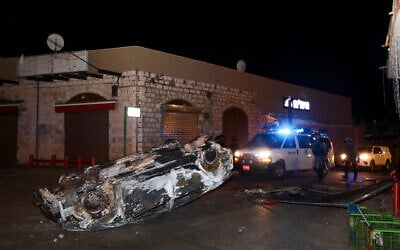The aftermath of riots in the central Israeli town of Lod, seen in the early hours of May 12, 2021. A state of emergency was declared after hours of Arab mob violence (Yossi Aloni/Flash90)