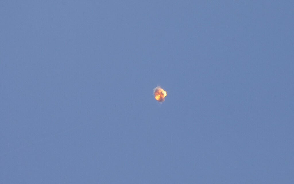 An Iron Dome interception missile hits a rocket fired from the Gaza Strip, as seen from the southern Israeli city of Sderot, May 13, 2021. (Noam Revkin Fenton/Flash90)