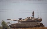 Israeli soldiers at a staging area near the Israeli border with Gaza, amid the escalation of Palestinian and Israeli violence. May 14, 2021. (Yonatan Sindel/FLASH90)