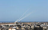 Rockets are launched by Palestinian terror groups into Israel, amid Israeli-Palestinian fighting. in Rafah, in the southern Gaza Strip, on May 19, 2021. (Abed Rahim Khatib/Flash90)