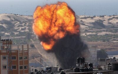 Flames and smoke billowing after an Israeli airstrike on the city of Rafah, in the southern Gaza Strip, on May 19, 2021. (Abed Rahim Khatib/FLASH90)