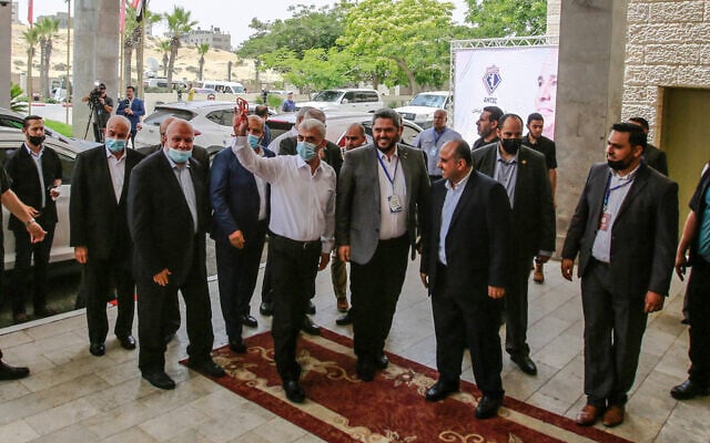 Yahya Sinwar, leader of the Palestinian Hamas movement meets with General Abbas Kamel, Egypt's intelligence chief, as he arrives for a meeting with leaders of Hamas in Gaza City. (Atia Mohammed/Flash90) Yahya Sinwar, leader of the Palestinian Hamas movement meets with General Abbas Kamel, Egypt's intelligence chief, as he arrives for a meeting with leaders of Hamas in Gaza City. (Atia Mohammed/Flash90)