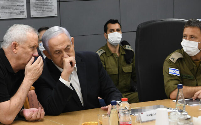 Defense Minister Benny Gantz and Prime Minister Benjamin Netanyahu during a consultation amid Hamas rocket fire at Israel and IDF counterstrikes, May 11, 2021. (Amos Ben Gershom / GPO) Defense Minister Benny Gantz and Prime Minister Benjamin Netanyahu during a consultation amid Hamas rocket fire at Israel and IDF counterstrikes, May 11, 2021. (Amos Ben Gershom / GPO)