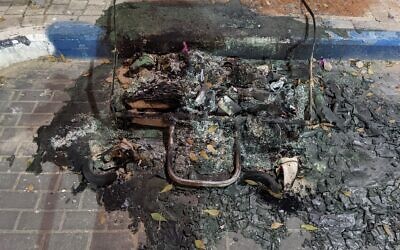 Trash set on fire in the middle of the street in North Jaffa, May 12, 2021.(Elie Bleier)