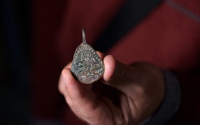 A 1,500-year-old amulet bearing God's name, found in northern Israel 40 years ago and handed to the Israel Antiquities Authority in May 2021. (Dafna Gazit/Israel Antiquities Authority) A 1,500-year-old amulet bearing God's name, found in northern Israel 40 years ago and handed to the Israel Antiquities Authority in May 2021. (Dafna Gazit/Israel Antiquities Authority)
