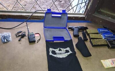 Police found Nazi literature, weapons and other troubling objects during a raid in Tucuman, Argentina. (Tucuman Federal Prosecutor No. 2 via JTA)