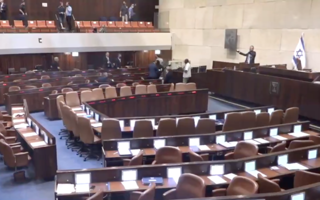 The Knesset plenum clears following a rocket alert on May 10, 2021. (Screen capture/Twitter) The Knesset plenum clears following a rocket alert on May 10, 2021. (Screen capture/Twitter)