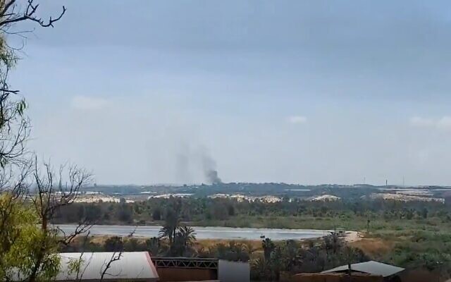 Smoke rises from the Gaza Strip following an IDF attack in response to an anti-tank guided missile attack from the enclave on an Israeli jeep near the community of Netiv Ha'asara on May 12, 2021. (Screen capture) Smoke rises from the Gaza Strip following an IDF attack in response to an anti-tank guided missile attack from the enclave on an Israeli jeep near the community of Netiv Ha'asara on May 12, 2021. (Screen capture)