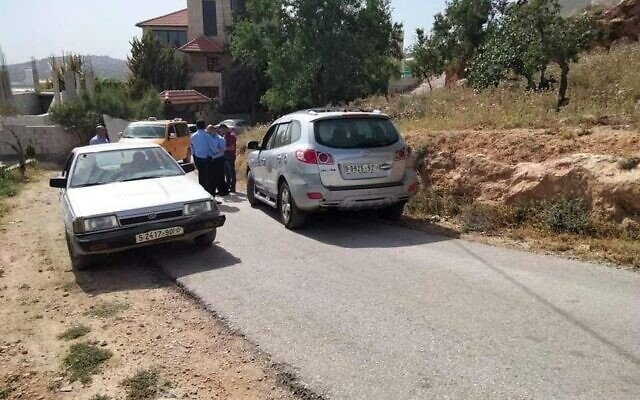 The vehicle (right) suspected of being used in a drive-by shooting attack is found in the village of Aqraba in the northern West Bank on May 3, 2021. (Social media) The vehicle (right) suspected of being used in a drive-by shooting attack is found in the village of Aqraba in the northern West Bank on May 3, 2021. (Social media)