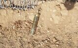 A suspected explosive device that was apparently flown into southern Israel with a balloon from the Gaza Strip lands in a field in the community of Kfar Aza on May 3, 2021. (Sha'ar Hanegev region)