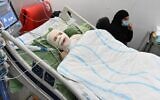 Muhammad, 12, who was injured by a firebomb at his home in Jaffa, pictured in his bed at Sheba Medical Center (courtesy of Sheba Medical Center)