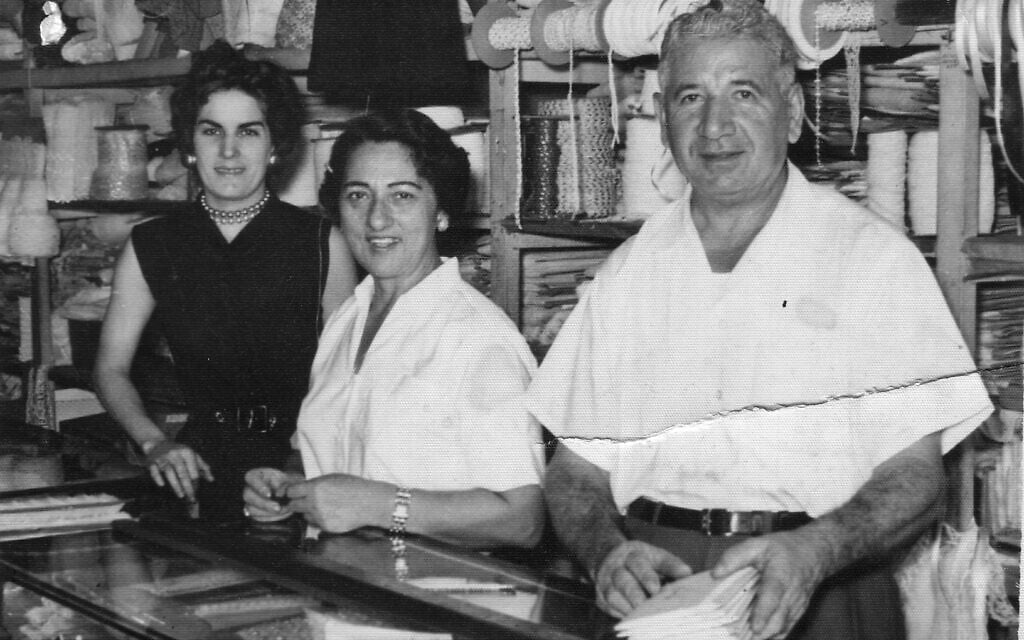 Ruth Behar's grandmother Esther and grandfather Maximo (center and right) at their lace store in Havana, with an employee, early 1950s. (Courtesy)