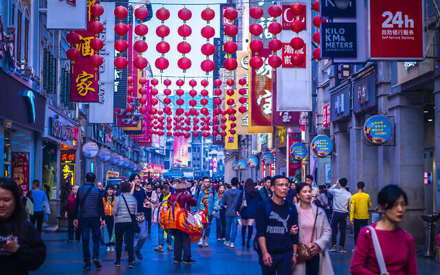 Guangzhou, China, December 2019. The Shangxiajiu pedestrian street in Liwan District, a main shopping district of the city and a major tourist attraction (Parichart Thongmee; iStock by Getty Images). Guangzhou, China, December 2019. The Shangxiajiu pedestrian street in Liwan District, a main shopping district of the city and a major tourist attraction (Parichart Thongmee; iStock by Getty Images).