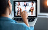 An illustrative image of a business deal on a Zoom call. (nensuria; iStock by Getty Images)