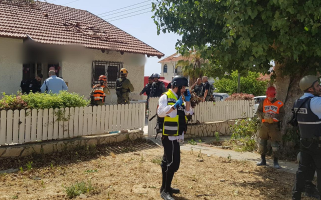 A building in Ashkelon where a woman was killed by a rocket fired from Gaza, May 11, 2021 (Zaka) A building in Ashkelon where a woman was killed by a rocket fired from Gaza, May 11, 2021 (Zaka)