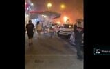 Screenshot from a video clip of a rocket landing in Holon, Israel, May 11, 2021, that circulated on social media. (Screenshot)