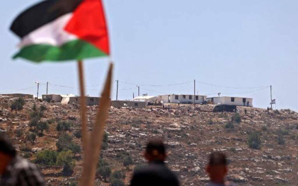 Palestinian protesters attend a demonstration against the Evyatar settlement outpost, south of Nablus, on June 4, 2021, in the West Bank. (JAAFAR ASHTIYEH / AFP)