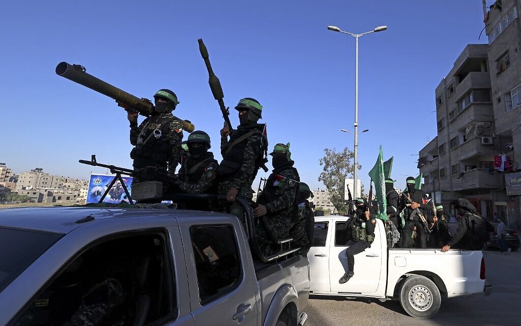 File: Members of the armed wing of Hamas parade in Gaza City on June 7, 2021. (MOHAMMED ABED/AFP) File: Members of the armed wing of Hamas parade in Gaza City on June 7, 2021. (MOHAMMED ABED/AFP)
