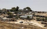 A view of houses in the unrecognized Bedouin village of Sawaneen in Israel's southern Negev Desert, on June 8, 2021. (Hazem Bader/AFP)
