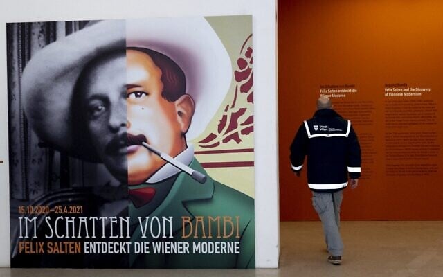A man passes by a poster of Felix Salten (L) as he enters the exhibition 'Beyond Bambi - Felix Salten and the Discovery of Viennese Modernism,' at the Wien Museum in Vienna, Austria, on March 23, 2021. (Joe Klamar/AFP) A man passes by a poster of Felix Salten (L) as he enters the exhibition 'Beyond Bambi - Felix Salten and the Discovery of Viennese Modernism,' at the Wien Museum in Vienna, Austria, on March 23, 2021. (Joe Klamar/AFP)