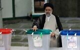 Iranian ultraconservative cleric and presidential candidate Ebrahim Raisi casts his ballot for the presidential election, in the capital Tehran, on June 18, 2021. (ATTA KENARE / AFP)