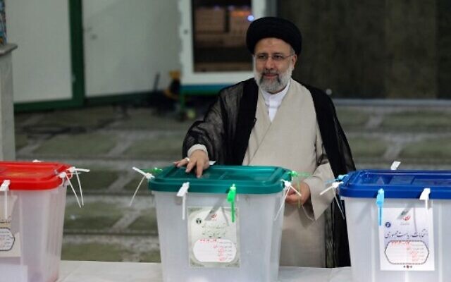 Iranian ultraconservative cleric and presidential candidate Ebrahim Raisi casts his ballot for the presidential election, in the capital Tehran, on June 18, 2021. (ATTA KENARE / AFP) Iranian ultraconservative cleric and presidential candidate Ebrahim Raisi casts his ballot for the presidential election, in the capital Tehran, on June 18, 2021. (ATTA KENARE / AFP)