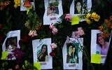 Photos of missing residents are posted at a makeshift memorial at the site of a collapsed building in Surfside, Florida, north of Miami Beach, on June 26, 2021.(Andrea SARCOS/AFP)