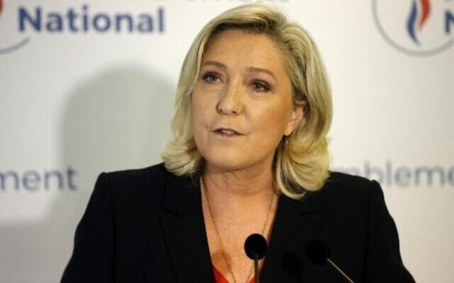 French far-right National Rally party's leader and member of parliament Marine Le Pen speaks to the press at the party's headquarters after the first results in the second round of the French regional elections in Nanterre on June 27, 2021. (Photo by GEOFFROY VAN DER HASSELT / AFP) French far-right National Rally party's leader and member of parliament Marine Le Pen speaks to the press at the party's headquarters after the first results in the second round of the French regional elections in Nanterre on June 27, 2021. (Photo by GEOFFROY VAN DER HASSELT / AFP)