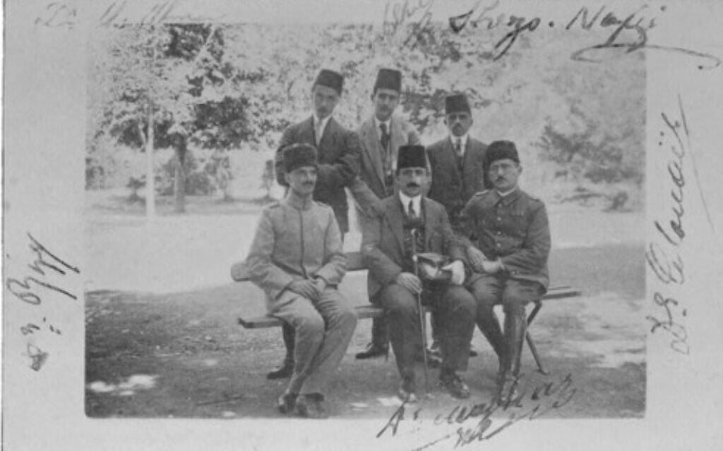 The doctors of the 'mad ward' at Haidar Pasha Hospital. Mazhar
Osman Bey, 'the greatest authority on mental diseases in Eastern
Europe,' is seated front row center. (Jones, 'The Road to En-Dor,' 1919)