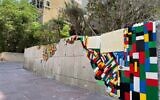 Legos used to repair a wall struck by a Gaza rocket in Ramat Gan on May 15, 2021. (Raz Sror)