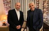 Yamina chief Naftali Bennett and Yesh Atid leader Yair Lapid are seen on Wednesday evening, as they inform President Reuven Rivlin they have succeeded in forming a government, June 2, 2021 (Courtesy)