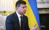 Ukraine President Volodymyr Zelensky, gestures as he talks to Britian's Prime Minister Boris Johnson,  during a meeting, in Downing Street, London, October 8, 2020. (Aaron Chown/Pool Photo via AP)