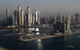 A general view of the Marina district towers is seen from the observation deck of 'The View at The Palm Jumeirah' in Dubai, United Arab Emirates, on April 6, 2021. (AP Photo/Kamran Jebreili)