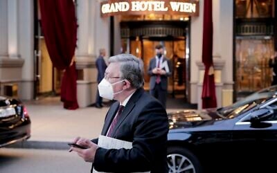 Russia's envoy to the International Atomic Energy Agency, Mikhail Ulyanov, stands in front of the Grand Hotel Vienna where closed-door nuclear talks with Iran take place, in Vienna, Austria, on Wednesday, June 2, 2021. (AP Photo/Lisa Leutner)