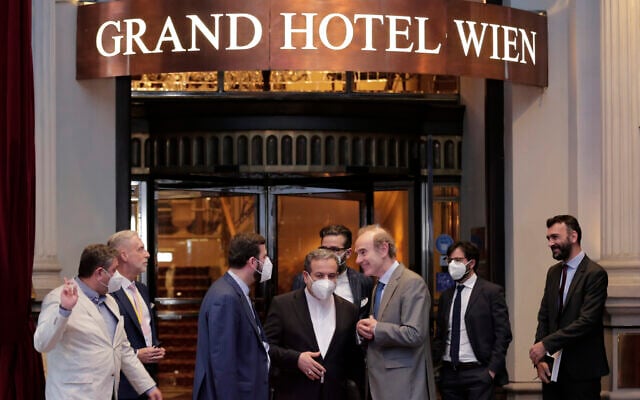 Iran's Governor to the International Atomic Energy Agency Kazem Gharib Abadi, Political deputy at the Ministry of Foreign Affairs of Iran Abbas Araghchi, and Deputy Secretary General and Political Director of the European External Action Service Enrique Mora stand in front of the Grand Hotel Vienna, where where closed-door nuclear talks take place in Vienna, Austria, on June 2, 2021. (AP Photo/Lisa Leutner) Iran's Governor to the International Atomic Energy Agency Kazem Gharib Abadi, Political deputy at the Ministry of Foreign Affairs of Iran Abbas Araghchi, and Deputy Secretary General and Political Director of the European External Action Service Enrique Mora stand in front of the Grand Hotel Vienna, where where closed-door nuclear talks take place in Vienna, Austria, on June 2, 2021. (AP Photo/Lisa Leutner)