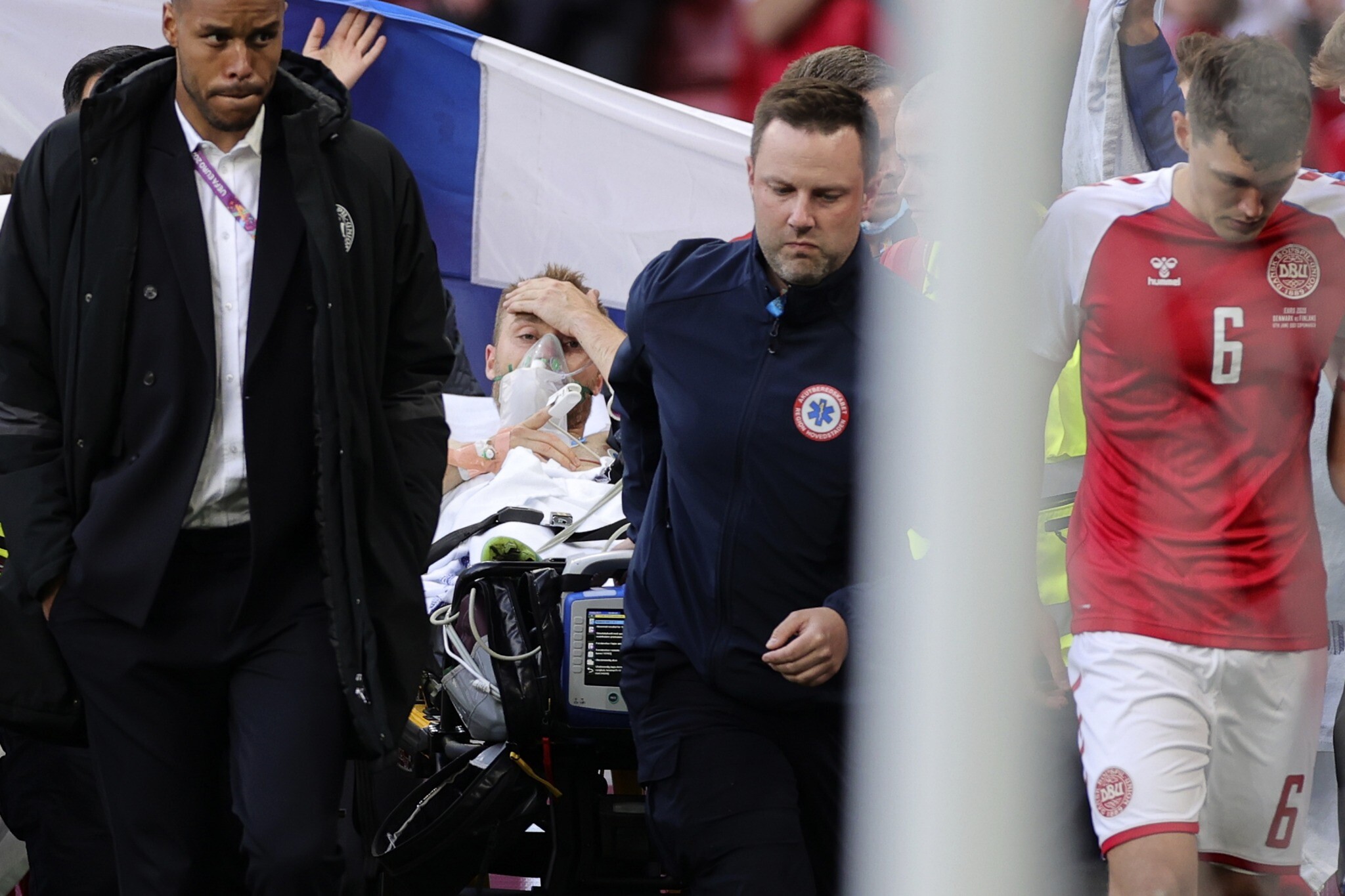 Denmark's Eriksen 'awake' in hospital after collapsing on pitch during