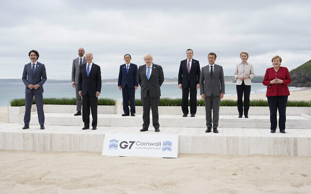 Leaders of the G7 pose for a group photo on overlooking the beach at the Carbis Bay Hotel in Carbis Bay, St. Ives, Cornwall, England, Friday, June 11, 2021. Leaders from left, Canadian Prime Minister Justin Trudeau, European Council President Charles Michel, U.S. President Joe Biden, Japan's Prime Minister Yoshihide Suga, British Prime Minister Boris Johnson, Italy's Prime Minister Mario Draghi, French President Emmanuel Macron, European Commission President Ursula von der Leyen and German Chancellor Angela Merkel. (AP Photo/Patrick Semansky, Pool) Leaders of the G7 pose for a group photo on overlooking the beach at the Carbis Bay Hotel in Carbis Bay, St. Ives, Cornwall, England, Friday, June 11, 2021. Leaders from left, Canadian Prime Minister Justin Trudeau, European Council President Charles Michel, U.S. President Joe Biden, Japan's Prime Minister Yoshihide Suga, British Prime Minister Boris Johnson, Italy's Prime Minister Mario Draghi, French President Emmanuel Macron, European Commission President Ursula von der Leyen and German Chancellor Angela Merkel. (AP Photo/Patrick Semansky, Pool)
