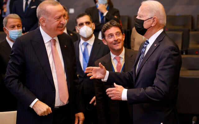 US President Joe Biden, right, speaks with Turkey's President Recep Tayyip Erdogan during a plenary session at a NATO summit in Brussels, June 14, 2021. (AP Photo/ Olivier Matthys, Pool) US President Joe Biden, right, speaks with Turkey's President Recep Tayyip Erdogan during a plenary session at a NATO summit in Brussels, June 14, 2021. (AP Photo/ Olivier Matthys, Pool)