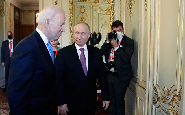 US President Joe Biden, left, and Russian President Vladimir Putin walk in a hall during their meeting at the 'Villa la Grange' in Geneva, Switzerland, June 16, 2021. (Mikhail Metzel/Pool Photo via AP) US President Joe Biden, left, and Russian President Vladimir Putin walk in a hall during their meeting at the 'Villa la Grange' in Geneva, Switzerland, June 16, 2021. (Mikhail Metzel/Pool Photo via AP)