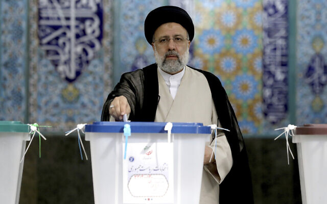 Ebrahim Raisi casts his vote at a polling station in Tehran, Iran, June 18, 2021. (AP Photo/Ebrahim Noroozi) Ebrahim Raisi casts his vote at a polling station in Tehran, Iran, June 18, 2021. (AP Photo/Ebrahim Noroozi)