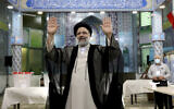 Ebrahim Raisi, who went on to win Iran's presidential election, waves after casting his vote at a polling station in Tehran, Iran, on June 18, 2021. (Ebrahim Noroozi/AP)