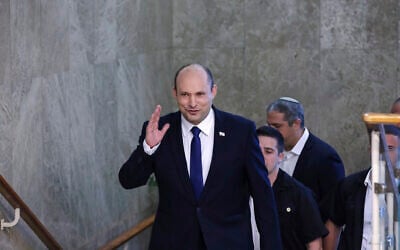 Prime Minister Naftali Bennett arrives for his first cabinet meeting at the Prime Minister's Office in Jerusalem on June 20, 2021. (Emmanuel Dunand/Pool Photo via AP)