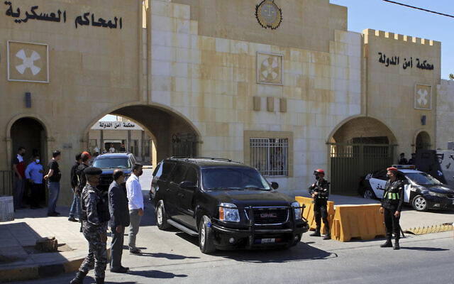 Bassem Awadallah, a former royal adviser, leaves a state security court in a vehicle after the first session of his trial, in Amman, Jordan, June 21, 2021. (AP Photo/Raad Adayleh) Bassem Awadallah, a former royal adviser, leaves a state security court in a vehicle after the first session of his trial, in Amman, Jordan, June 21, 2021. (AP Photo/Raad Adayleh)