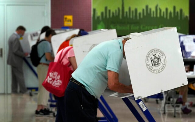 Voters mark their ballots at Frank McCourt High School, in New York, Tuesday, June 22, 2021. The final votes are set to be cast Tuesday in New York's party primaries, where mayors, prosecutors, judges and city and county legislators will be on the ballot, along with other municipal offices. (AP Photo/Richard Drew) Voters mark their ballots at Frank McCourt High School, in New York, Tuesday, June 22, 2021. The final votes are set to be cast Tuesday in New York's party primaries, where mayors, prosecutors, judges and city and county legislators will be on the ballot, along with other municipal offices. (AP Photo/Richard Drew)