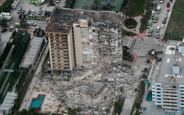 This aerial photo shows part of the 12-story oceanfront Champlain Towers South Condo that collapsed on early June 24, 2021, in Surfside, Florida. (Amy Beth Bennett/South Florida Sun-Sentinel via AP) This aerial photo shows part of the 12-story oceanfront Champlain Towers South Condo that collapsed on early June 24, 2021, in Surfside, Florida. (Amy Beth Bennett/South Florida Sun-Sentinel via AP)